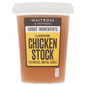 Cook's ingredients a ladle of chicken stock